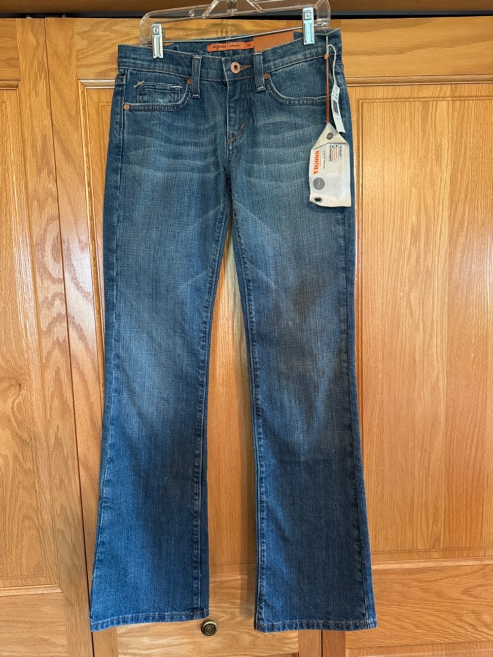 Y2K Vigoss Faded Blue Boot Cut Jeans. Size 1/2. Slight distress on pocket